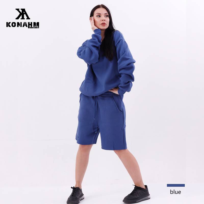 girl wearing a blue jumper/ sweater